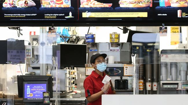 McDonalds employees in NSW will join their Melbourne colleagues in wearing face masks. Picture: Ian Currie