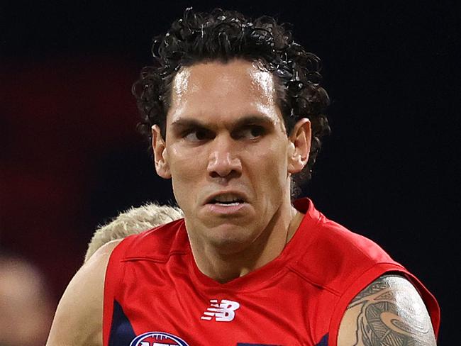 Melbourne's Harley Bennell breaks away during AFL match between the Hawthorn Hawks and Melbourne Demons at Giants Stadium, Sydney. Picture. Phil Hillyard