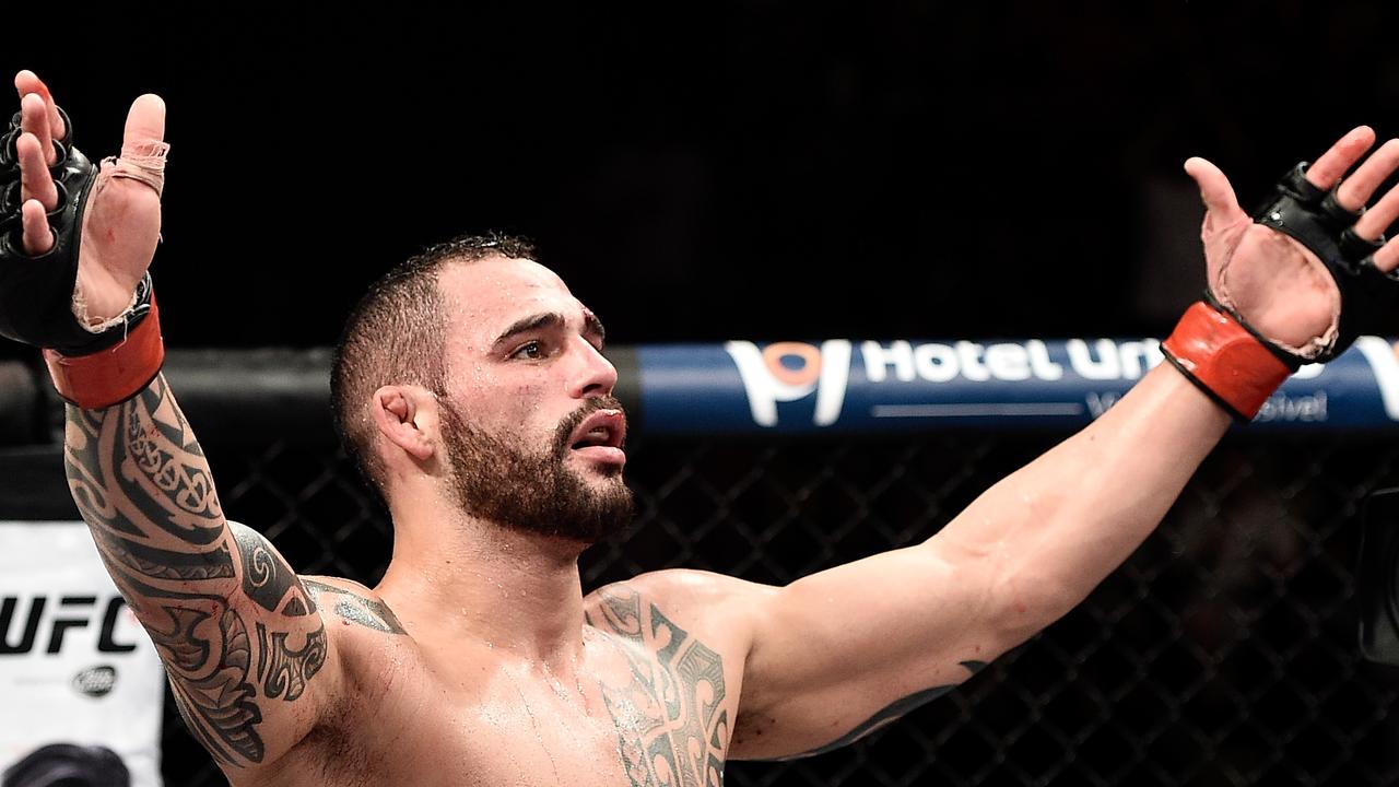 PORTO ALEGRE, BRAZIL - FEBRUARY 22: Santiago Ponzinibbio of Argentina celebrates after defeating Sean Strickland of the United States in their welterweight bout during the UFC Fight Night at Gigantinho Gymnasium on February 22, 2015 in Porto Alegre, Brazil. (Photo by Buda Mendes/Zuffa LLC/Zuffa LLC via Getty Images)