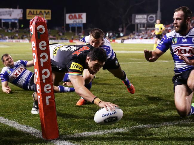 Dallin Watene-Zelezniak scores a try in the corner.