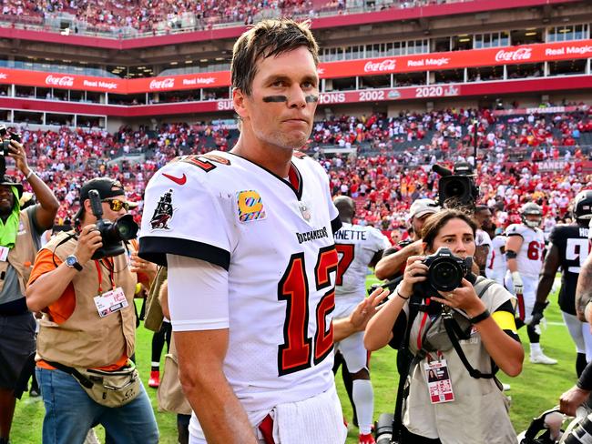 TAMPA, FLORIDA - OCTOBER 09: Tom Brady #12 of the Tampa Bay Buccaneers walks off the field after defeating the Atlanta Falcons 21-15 at Raymond James Stadium on October 09, 2022 in Tampa, Florida.   Julio Aguilar/Getty Images/AFP