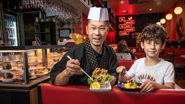 Hi Sushi head chef Leslie Chan and customer Ramon La Torre at Geelong's first sushi train. Picture: Brad Fleet