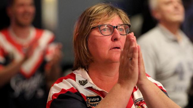 A nervous Roosters fan watching the game at Easts Leagues Club.