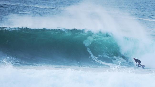 Metres-high waves are still pounding the Sydney coastline at Bronte. Picture: John Grainger