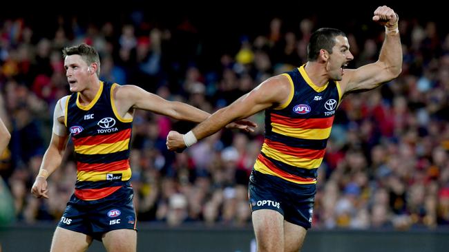 Taylor Walker celebrates one of his four goals against the Gold Coast Suns in Round 5.