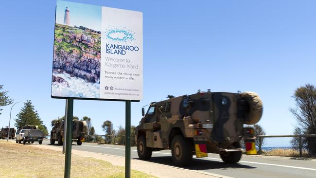 Reservists from the 10th/27th Battalion, Royal South Australia Regiment, in Bushmaster protected mobility vehicles arrive in Penneshaw on Kangaroo Island.