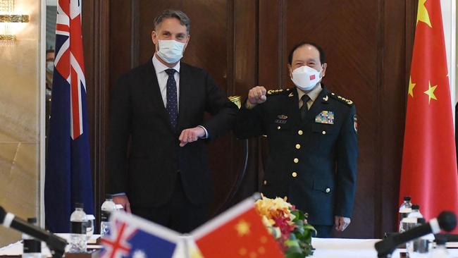 Richard Marles and China's Defence Minister Wei Fenghe meet on the sidelines of the Shangri-La Dialogue summit in Singapore. Picture: AFP/Department of Defence