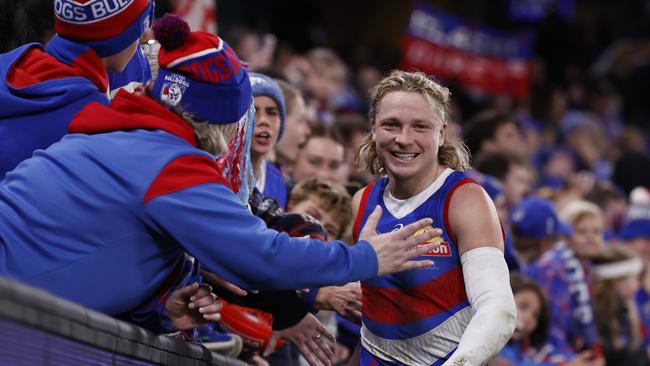 MELBOURNE, AUSTRALIA - JULY 13: Cody Weightman of the Bulldogs acknowledges the fans after the round 18 AFL match between Western Bulldogs and Carlton Blues at Marvel Stadium, on July 13, 2024, in Melbourne, Australia. (Photo by Darrian Traynor/AFL Photos/via Getty Images)