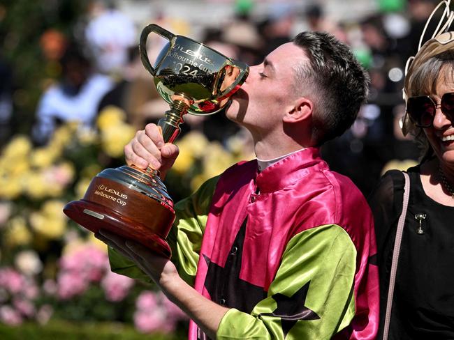 Robbie Dolan after winning the Melbourne Cup last year. Dolan will sing at Wednesday’s Launceston Cup. (Photo by William WEST / AFP)