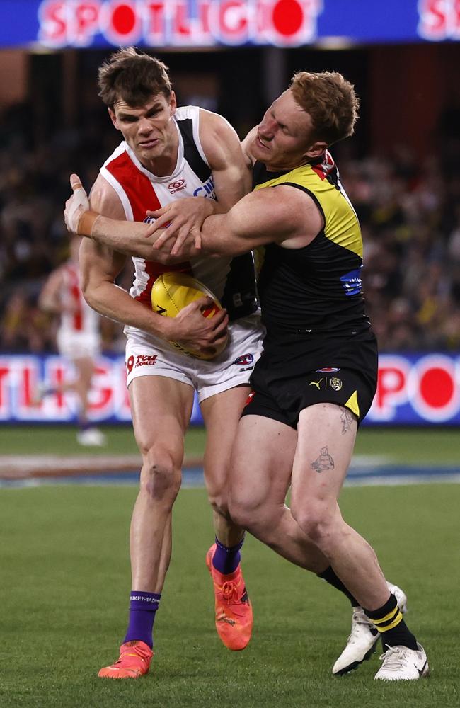 Nick Vlastuin tackles Mason Wood on Sunday night. Picture: Darrian Traynor/Getty Images.