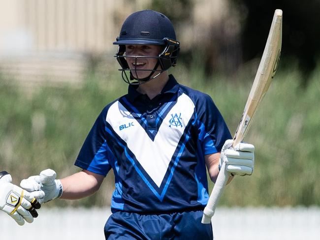 Jake Fraser-McGurk raises his bat after making a ton for Victoria Metro at last year’s under-17s national championships. Picture: Cricket Australia