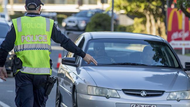 Police checking cars at Griffith St in Coolangatta. Picture: Jerad Williams.