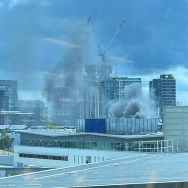 Smoke billows from a fire at Bowen Hills.