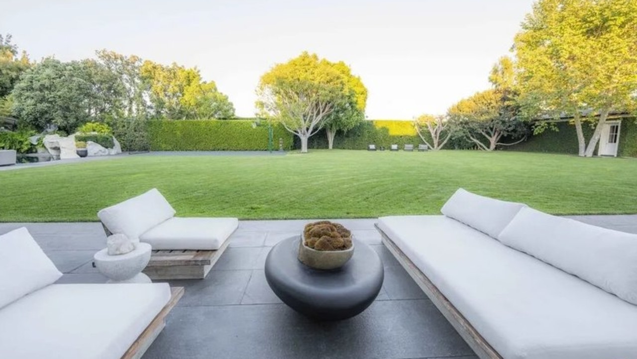 The outdoor area surrounded by hedges. Picture: Realtor