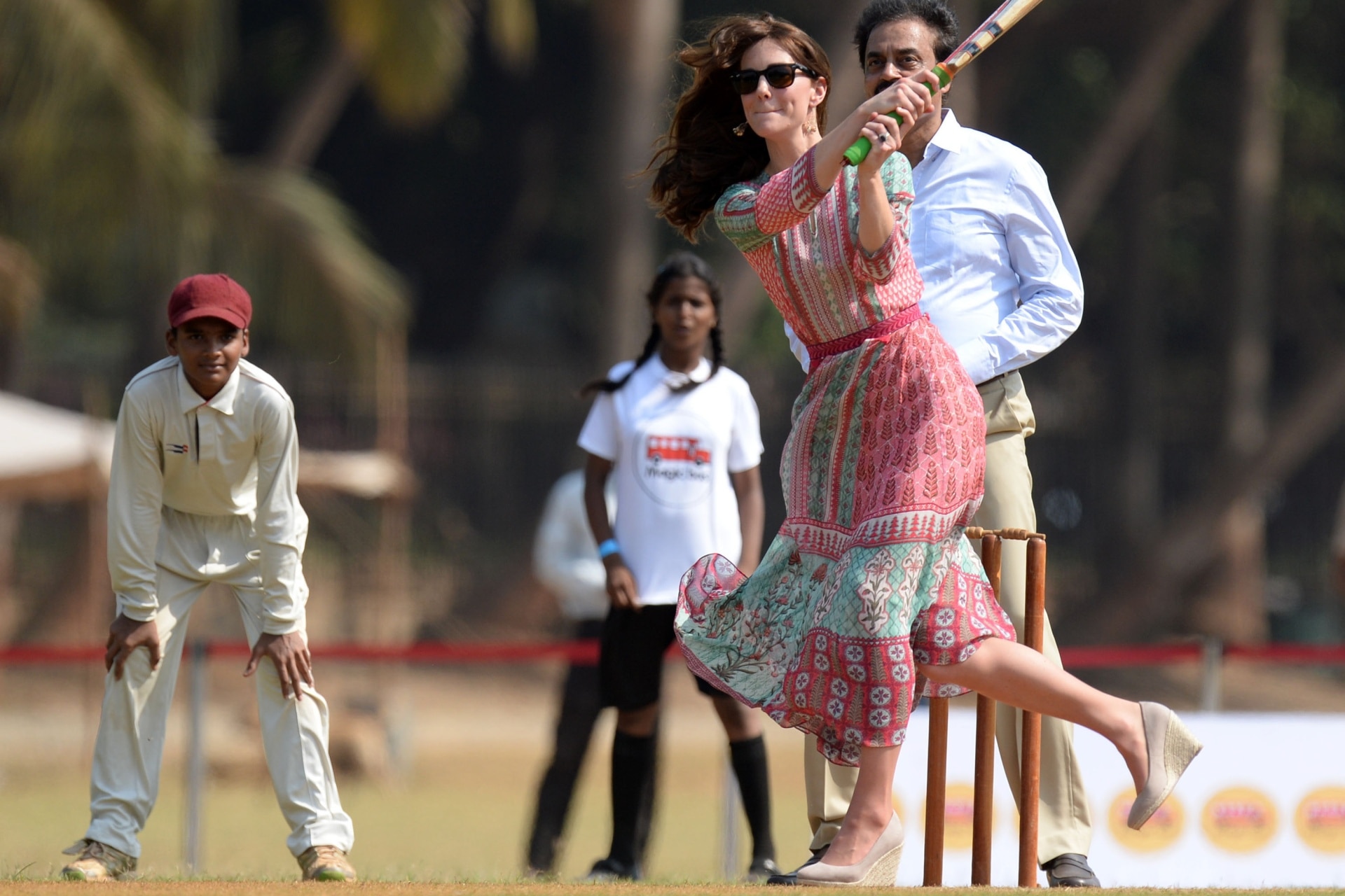 <p>Playing cricket in India. </p>