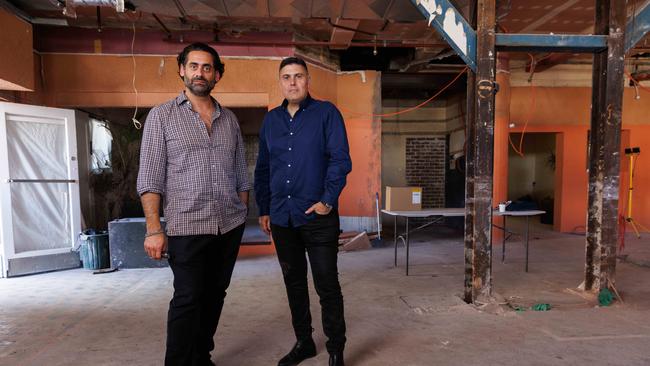 Jon Adgemis at the rebuild of Oxford House in Paddington with Peter Crinis, who ran the hospitality side of the business. Picture: David Swift