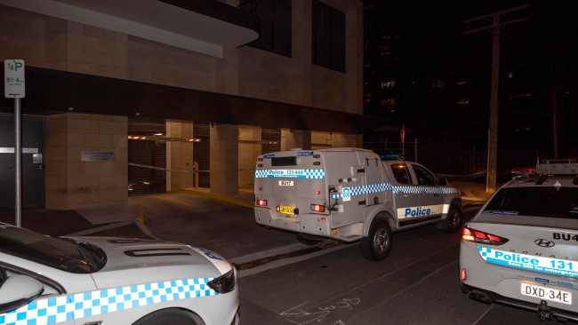 NSW Police officers cordoned off the scene where the shooting took place. Picture: Liam Mendes / The Australian