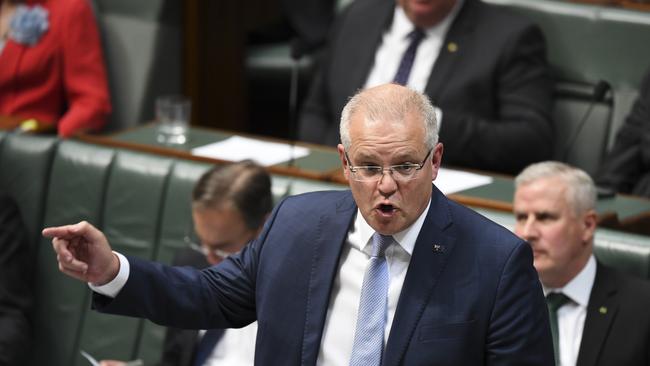 Australian Prime Minister Scott Morrison speaks during House of Representatives Question Time at Parliament House in Canberra. (AAP Image/Lukas Coch)