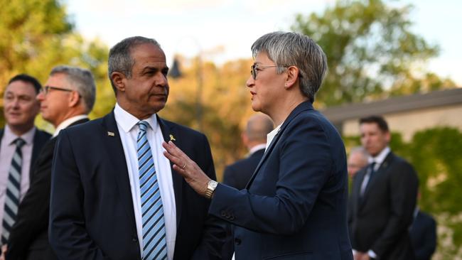 Senator Penny Wong and Israel's Ambassador to Australia Amir Maimon attend the October 7 vigil at the Israeli Embassy in Canberra. Picture: Martin Ollman