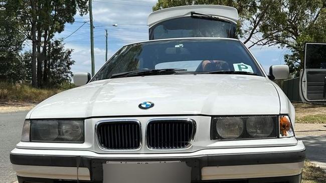 A teen pizza delivery driver was held up at gunpoint and his BMW was stolen