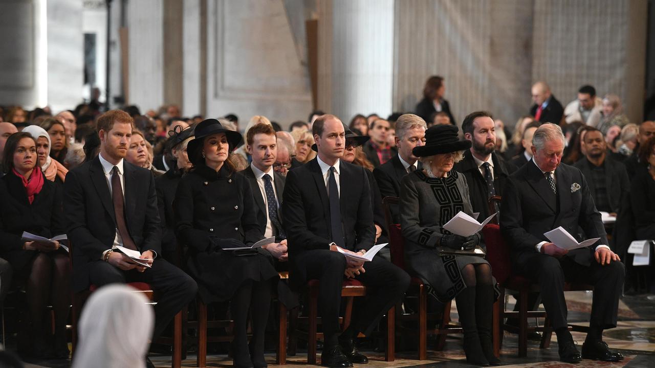 Fall from grace: By contrast, Prince Harry sat next to his brother and sister-in-law at the Grenfell Tower National Memorial service in 2017. Picture: Stefan Rousseau-WPA Pool Getty Images