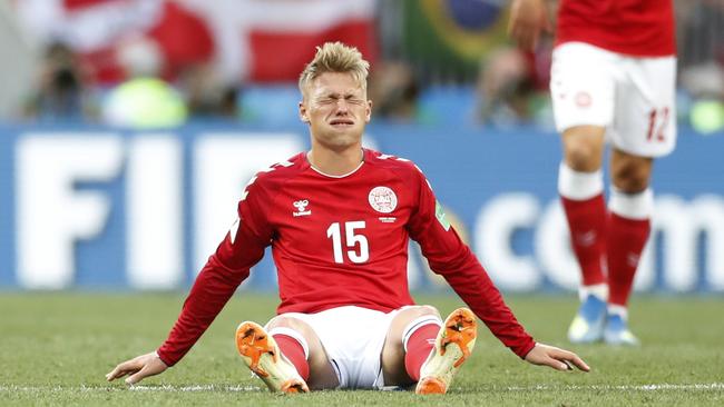 Denmark's Viktor Fischer grimaces during the group C match between Denmark and France at the 2018 soccer World Cup at the Luzhniki Stadium in Moscow, Russia, Tuesday, June 26, 2018. (AP Photo/Antonio Calanni)