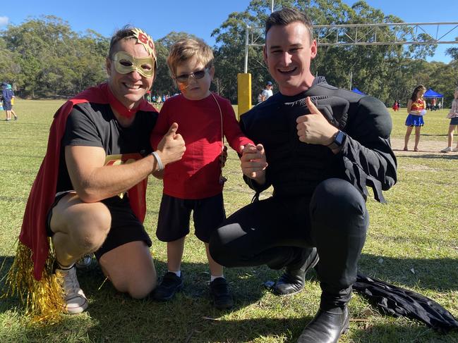 Musgrave Hill State School Deputy Principal Luke Kenelley and Bonney MP Sam O’Connor with Slater Clifton-Walker at his Hero Day fundraiser for brain cancer research.