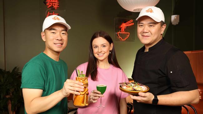 Paper Tiger staff Karl Tang, Peggy Jackson and Benjamin Liew. Picture: Emma Brasier