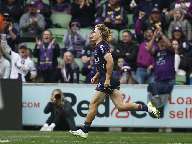 MELBOURNE, AUSTRALIA - AUGUST 26: Fans cheer as Ryan Papenhuyzen of the Storm runs onto the field from the interchange during the round 26 NRL match between Melbourne Storm and Gold Coast Titans at AAMI Park on August 26, 2023 in Melbourne, Australia. (Photo by Daniel Pockett/Getty Images)