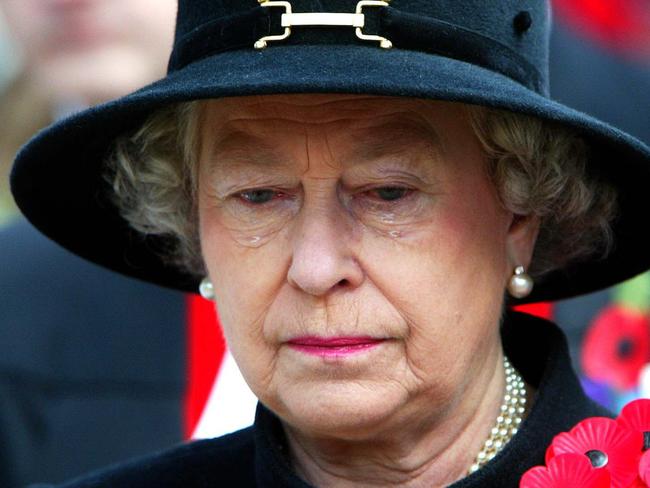 Britain's Queen Elizabeth II sheds a tear during the Field of Remembrance Service at /Westminster /Abbey Nov 07  2002 in /St /Margaret's /churchyard. (AP Pic/Jeremy Selwyn /Evening /Standard)  headshot sad tears royalty