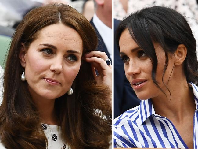 LONDON, ENGLAND - JULY 14:  Catherine, Duchess of Cambridge and Meghan, Duchess of Sussex attend day twelve of the Wimbledon Lawn Tennis Championships at All England Lawn Tennis and Croquet Club on July 14, 2018 in London, England.  (Photo by Clive Mason/Getty Images)