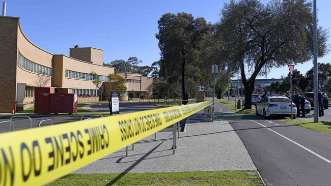 Police at Adelaide High School on West Terrace, after a man was left in a critical condition after being assaulted by four men overnight. Picture: Naomi Jellicoe