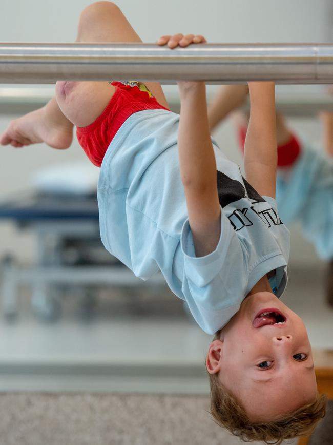 Sebastian, 4, plays around while waiting to try out his new prosthetic leg. Picture: Jay Town