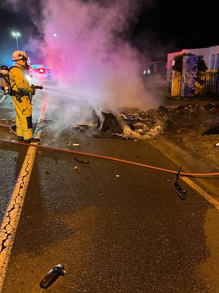 The burning wreckage of the McLaren.