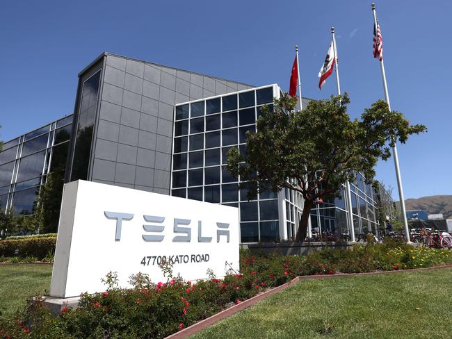 FREMONT, CALIFORNIA - APRIL 20: A sign is posted in front of a Tesla office on April 20, 2022 in Fremont, California. Tesla reported first quarter earnings that far exceeded analyst expectations with revenue of $18.76 billion compared to expectations of $17.80 billion.   Justin Sullivan/Getty Images/AFP == FOR NEWSPAPERS, INTERNET, TELCOS & TELEVISION USE ONLY ==