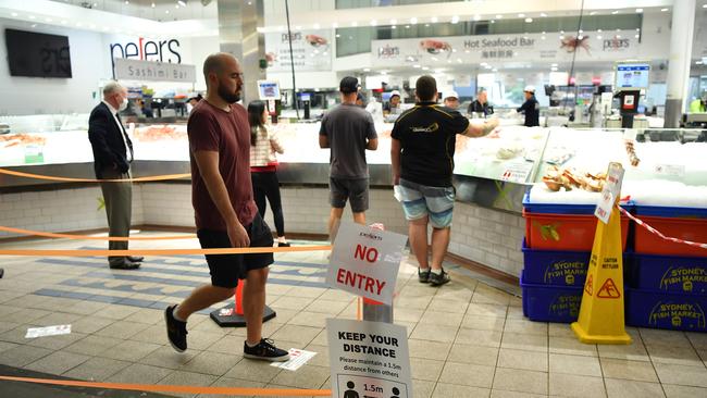 Social distancing measures in place for Easter Long Weekend trading at the Sydney Fish Market. Picture: AAP