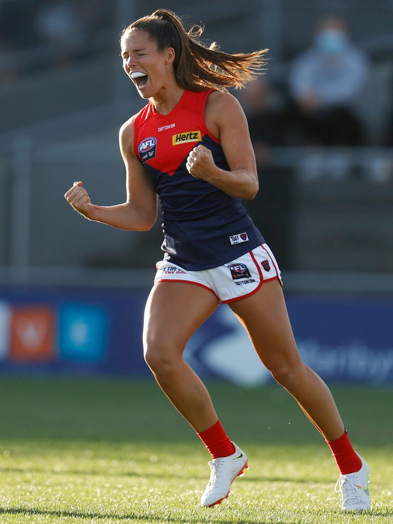 Kate Hore of the Demons celebrates a goal.