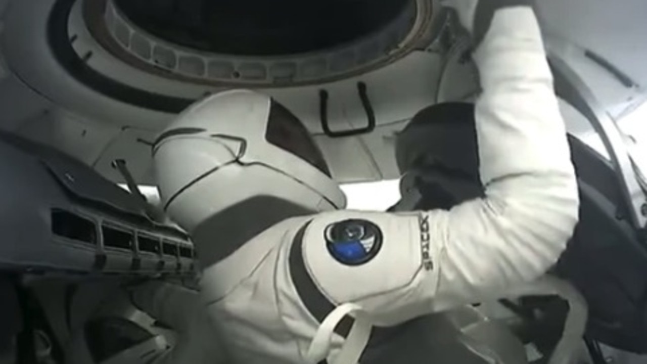 Isaacman pops open the capsule. Picture: SpaceX