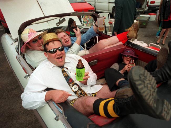 Punters Marc Quinn, Mick Davies, Damian Murphy and Paul McKenzie enjoy the day from the comfort of their convertible in 1996.