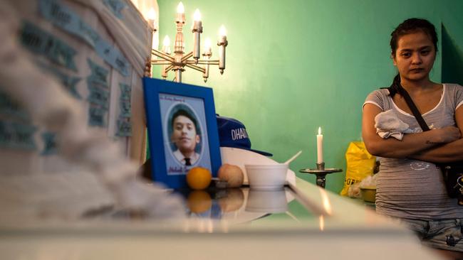 This woman’s husband was found dead in the streets of Manila with a crude cardboard poster left behind by the motorcycle-riding gunmen killers saying 