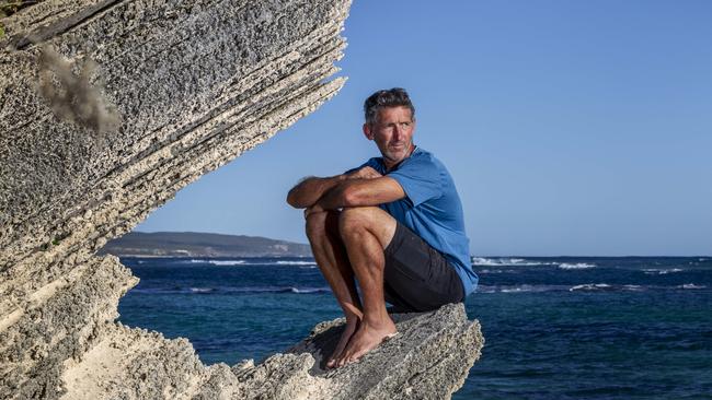 Ocean of grief: Aaron Cockman at Gnarabup Beach, Margaret River, where he’d hoped to scatter the ashes of his children today. Picture: Marie Nirme