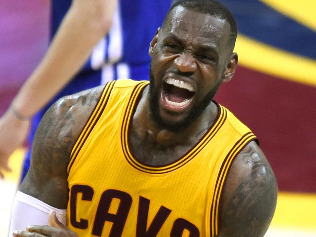 (FILES) Cleveland Cavaliers' LeBron James yells after a score against the Golden State Warriors during Game 3 of the 2015 NBA Finals in this June 9, 2015, file photo in Cleveland, Ohio. LeBron James has signed a lifetime deal with US sporting goods giant Nike it was confirmed on December 7, 2015 in what was described as the largest single athlete deal in the company's history. Nike confirmed the agreement -- believed to be the first lifetime deal in the company's 44-year history -- in a brief statement. AFP PHOTO/TIMOTHY A. CLARY/FILES