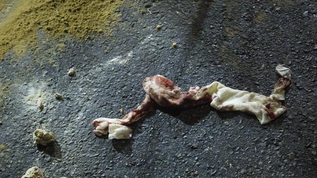 A blooded bandage lies on the road at the scene where an Israeli Arab man was attacked and injured by an Israeli Jews mob on May 12, 2021 in Bat Yam, Israel. Picture: Amir Levy/Getty Images