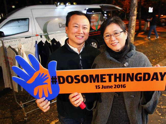 Maria and Kelvin Ting volunteering with Clothesline. Picture: Phil Rogers