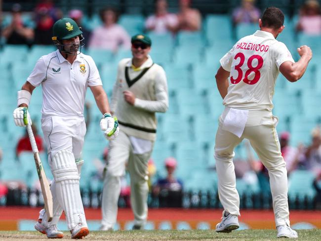 Josh Hazlewood celebrates Elgar’s wicket at the SCG. Picture: David Gray/AFP