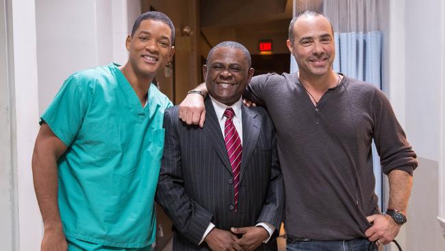 Actor Will Smith, the real life Dr Bennet Omalu and director Peter Landesman on the set of film Concussion.