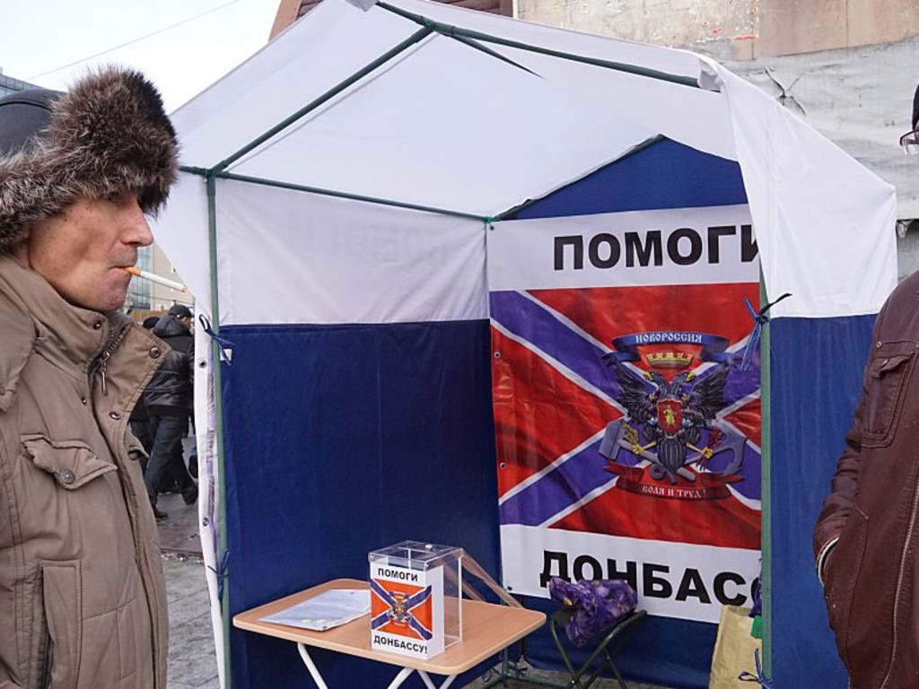 A poster with the flag of Novorossiya reading ‘Help Donbas’ in 2015.