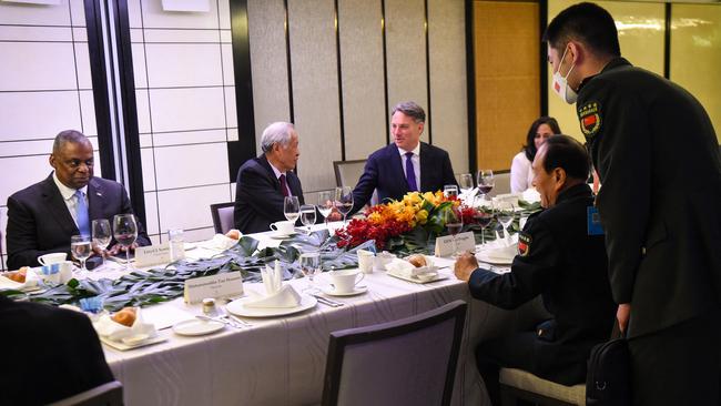 US Defence Secretary Lloyd Austin talks to Wei Fenghe as Singapore's Defence Minister Ng Eng Hen, second from left, greets Mr Marles, during the ministerial roundtable luncheon at the Shangri-La Dialogue summit in Singapore. Picture: AFP