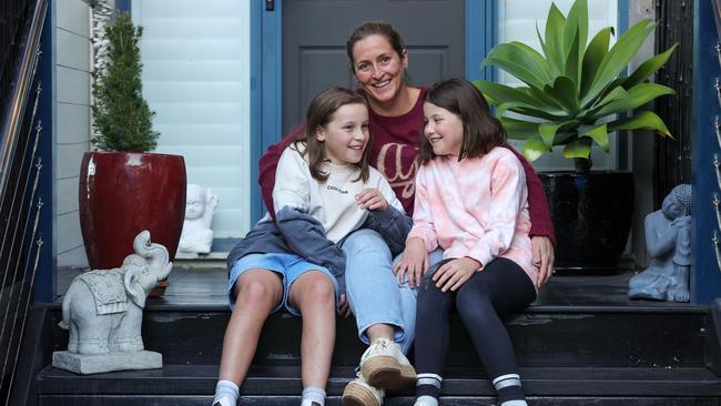 Lilly, 10, and Ruby Zanet, 8, with mum Davina Zanet, at home in South Coogee. Picture: Justin Lloyd.