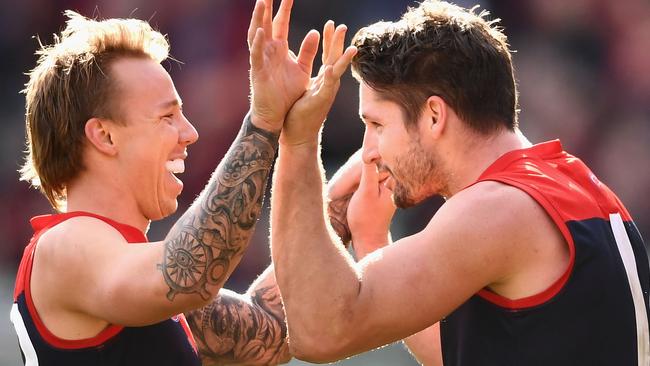 Jesse Hogan celebrates a goal with James Harmes on Sunday. Picture: Getty Images